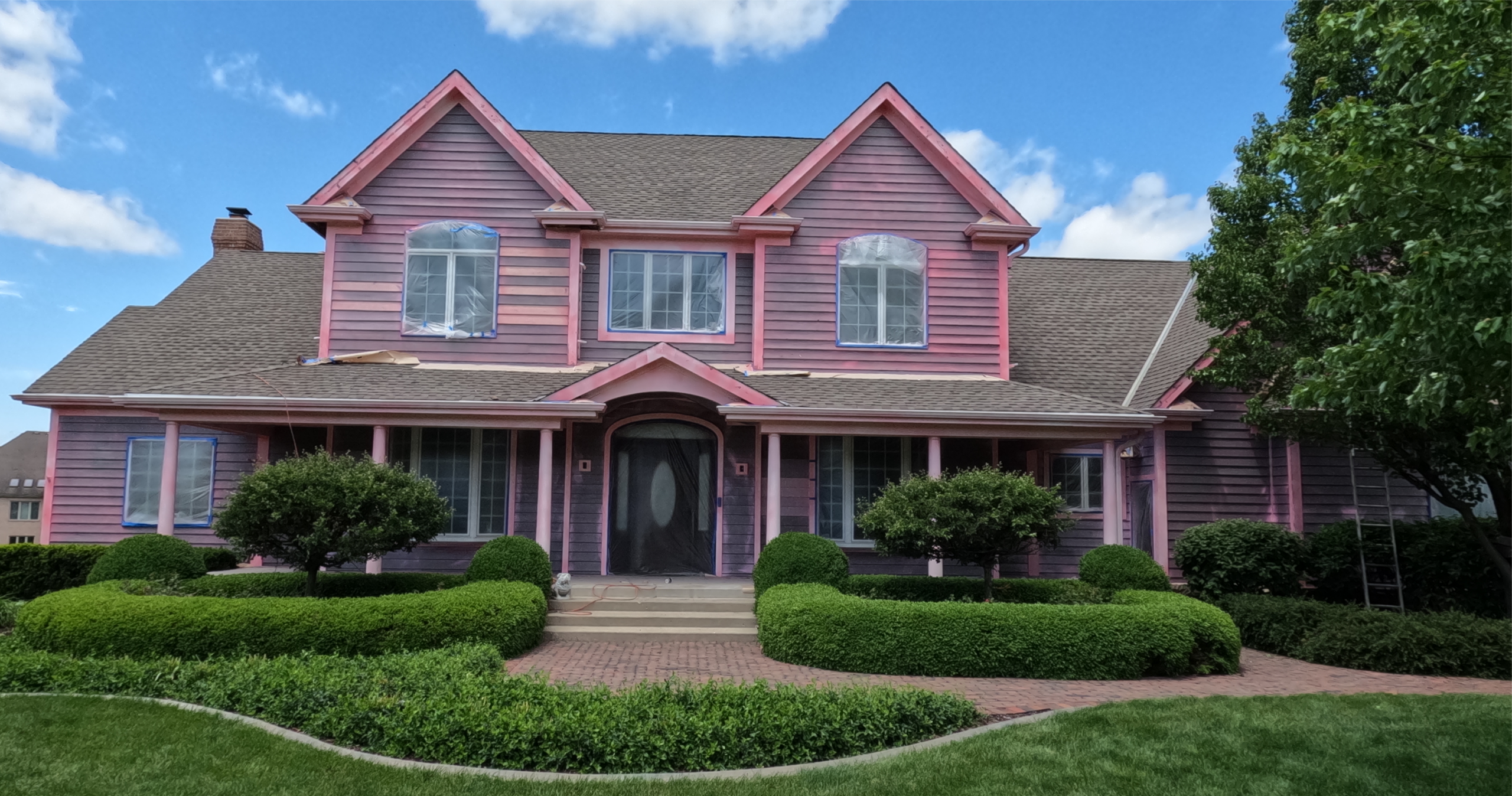 Before Pic of Cedar Sided House Primed With With Home Shield Coating® Pink Primer Bonding Agent.