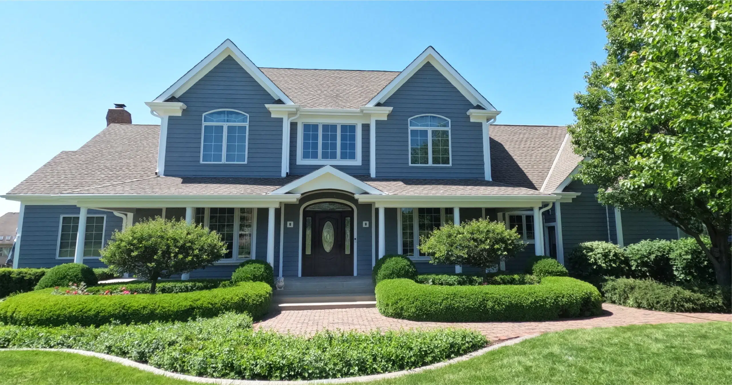 After Pic of Cedar Sided House Coated With Home Shield Coating® Top Coat.